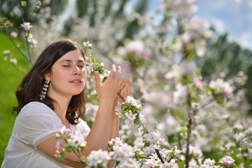 woman with flowers in park