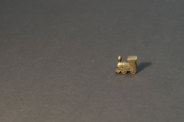 tiny metal toy locomotive