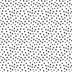 Spotted seamless pattern. Vector hand-drawn background.