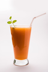 Musk melon juice with slice, also known as Kharbuj/kharbuja fruit extract, served in a glass with mint. selective focus