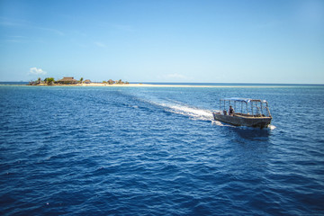 A boat trip to a small Fiji island in the Pacific ocean