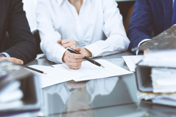 Bookkeepers team or financial inspectors  making report, calculating or checking balance. Tax service financial document. Audit concept