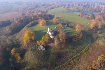 View of the old Church of St. George on the Voronich fortification on a sunny October day (aerial...