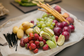 Various, assorted fruits (grape, apple, pear, cherry, apricot, plum, peach, strawberries)