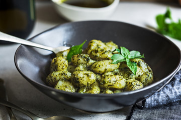 Gnocchi in homemade Basil Pesto sauce in a bowl