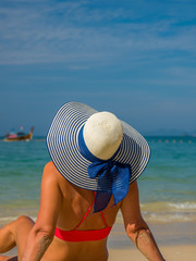 Young woman at the tropical beach