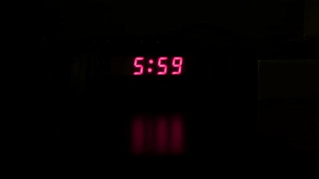 digital alarm clock gets pushed off table