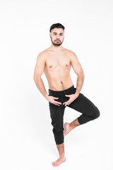 Fototapeta premium Young , attractive modern dancer posing over white background