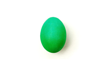 Green painteded chicken egg isolated on the white background.