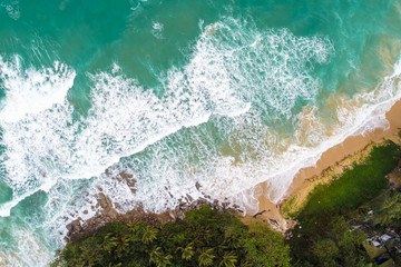 Beach aerial view with turquoise sea wave