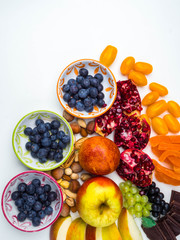 super antioxidants. superfood. mix of fresh fruits and berries, rich with resveratrol, vitamins, raw food ingredients. nutrition background, nutrient-rich foods are good for your heart and brain