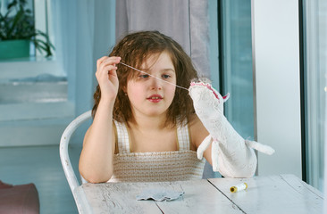 small girls with hand puppets