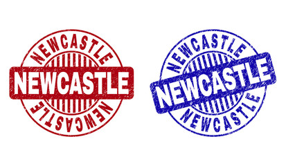 Grunge NEWCASTLE round stamp seals isolated on a white background. Round seals with grunge texture in red and blue colors. Vector rubber overlay of NEWCASTLE label inside circle form with stripes.