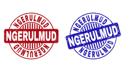 Grunge NGERULMUD round stamp seals isolated on a white background. Round seals with distress texture in red and blue colors. Vector rubber overlay of NGERULMUD caption inside circle form with stripes.