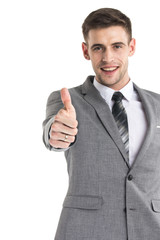 Happy businessman thumbs up sign