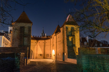 Fototapeta premium Medieval Warsaw barbican at night.