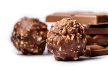 Chocolate Bar and Chocolate Bonbons on White Background