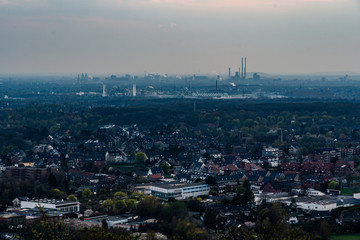 Fototapeta na wymiar residential urban area of Oberhausen Germany Europe with heavy industry of the Ruhr Area, Ruhrgebiet, in background