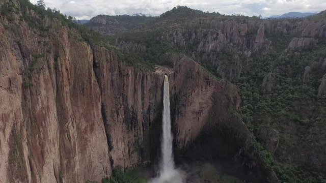 Aerial wide drone shot of the Basaseachi waterfall in the Candamena Canyon, Chihuahua