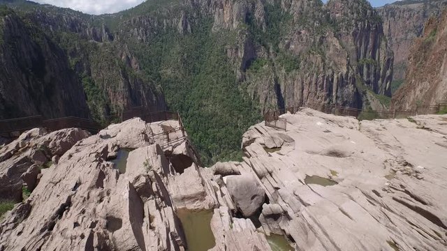 Aerial tilt down drone shot revealing the Basaseachi waterfall in the Candamena Canyon, Chihuahua