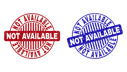 Grunge NOT AVAILABLE round stamp seals isolated on a white background. Round seals with grunge texture in red and blue colors.
