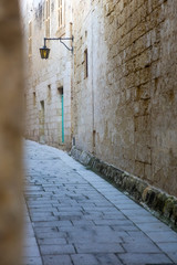 Picturesque narrow street of medieval town Mdina, Malta