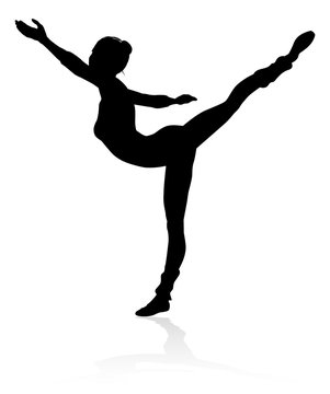 Ballet dancer woman in silhouette dancing in posed position