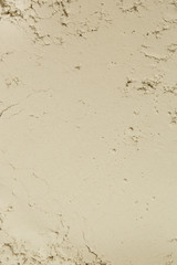 Cosmetic clay powder textured background, close up, 