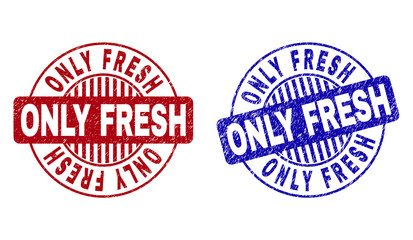 Grunge ONLY FRESH round stamp seals isolated on a white background. Round seals with grunge texture in red and blue colors. Vector rubber watermark of ONLY FRESH text inside circle form with stripes.