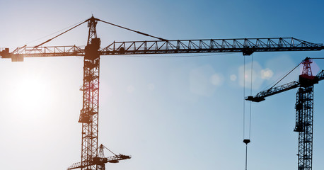 crane on the background of blue sky, panoramic shot