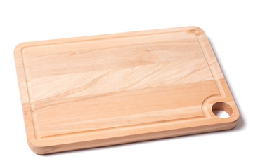 Brand new kitchen rectangle wooden board for cutting food groceries isolated above white background.