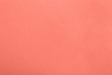Fototapeta premium Coral pink toned paper parchment background
