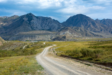 Fototapeta na wymiar Dirt road in the Altai mountains
