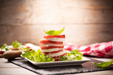 Caprese. Sliced tomato and Mozzarella i