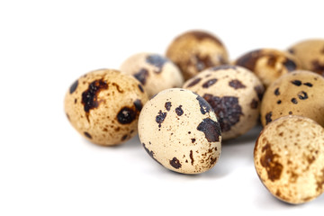 quail eggs isolated on white background. close up