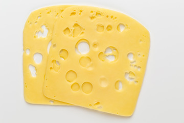 Cheese slice on white background.
