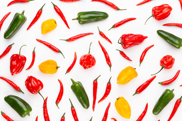Spice herbal leaves and chili pepper on white background. Vegetables pattern. Floral and vegetables on white background. Top view, flat lay.