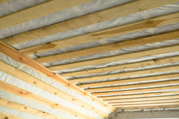 Overhaul and reconstruction of large-size sand-lime brick. The working process of insulation of the inner part of the roof.