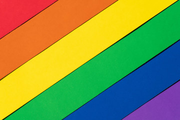 Horizontal. Multicolored striped flag LGBT, located on the diagonal, showing love without borders and rules. View from above