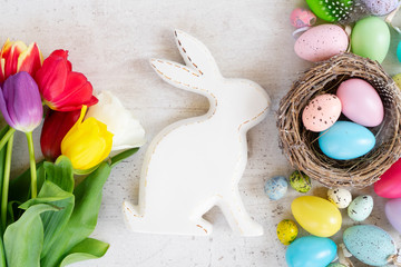 Easter colored eggs with tulips