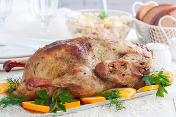 Festive stuffed oranges duck on a dish, horizontal