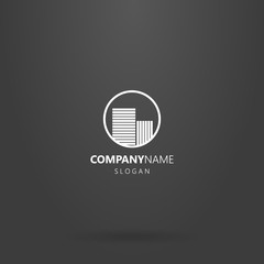 Obraz premium white logo on a black background. simple line art logo of two high-rise houses in a round frame