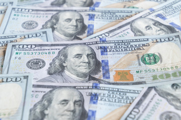 Money USA dollar banknotes for background.Money is any item or verifiable record that is generally accepted as payment for goods and services and repayment of debts