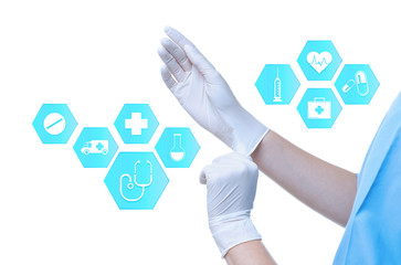 Doctor putting on rubber gloves and informational icons against white background, closeup. Medical service