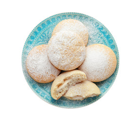Plate with cookies for Islamic holidays isolated on white, top view. Eid Mubarak