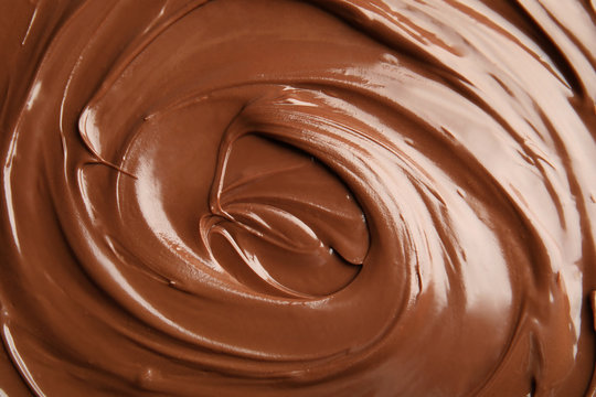Sweet tasty chocolate cream as background, closeup