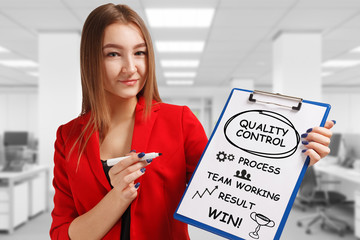 Business, technology, internet and networking concept. Young entrepreneur showing keyword: Quality...