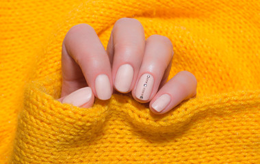 Beige nails on white background