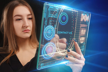The concept of business, technology, the Internet and the network. A young entrepreneur working on a virtual screen of the future and sees the inscription: Contact us