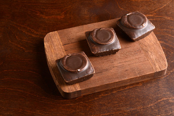 top view small dark chocolate covered cakes